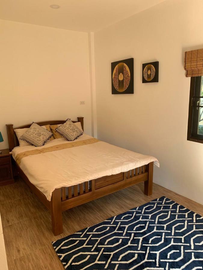 Sunray Guesthouse สุนันท์บ้านพักริมคลอง Uthai Thani Buitenkant foto