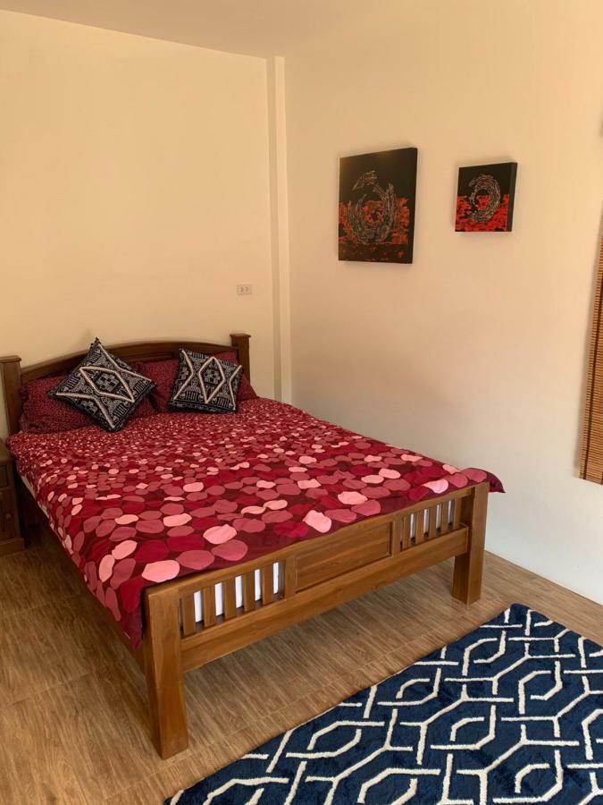 Sunray Guesthouse สุนันท์บ้านพักริมคลอง Uthai Thani Buitenkant foto