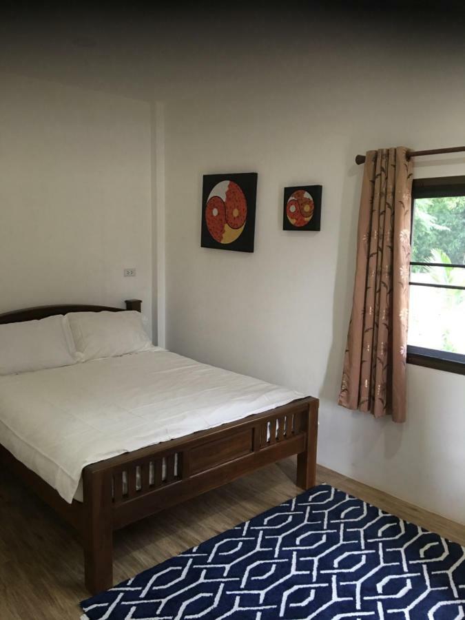 Sunray Guesthouse สุนันท์บ้านพักริมคลอง Uthai Thani Buitenkant foto